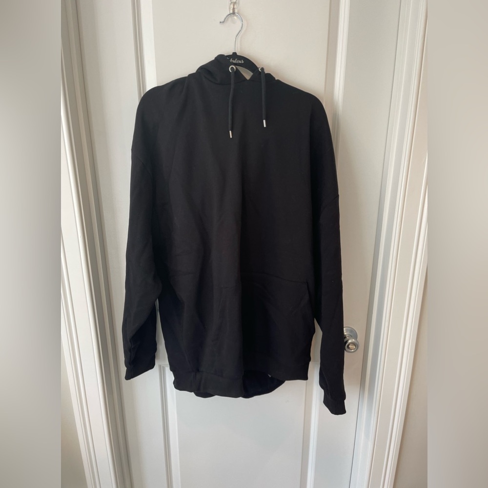 asos black hoodie with face design in a women’s size 3xl
